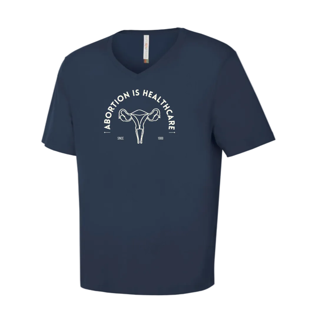 Navy blue  V neck t-shirt with white graphic and text says Abortion is Healthcare