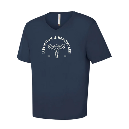 Navy blue  V neck t-shirt with white graphic and text says Abortion is Healthcare