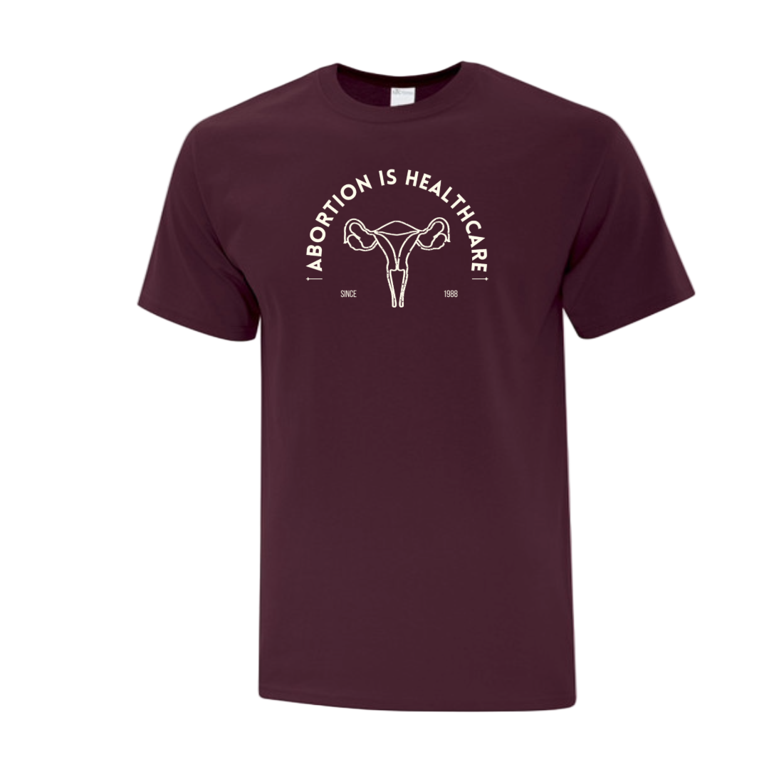 Maroon t-shirt with 'Abortion is Healthcare' graphic 