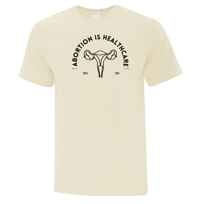 Natural color t-shirt with black graphic that reads "Abortion is Healthcare"