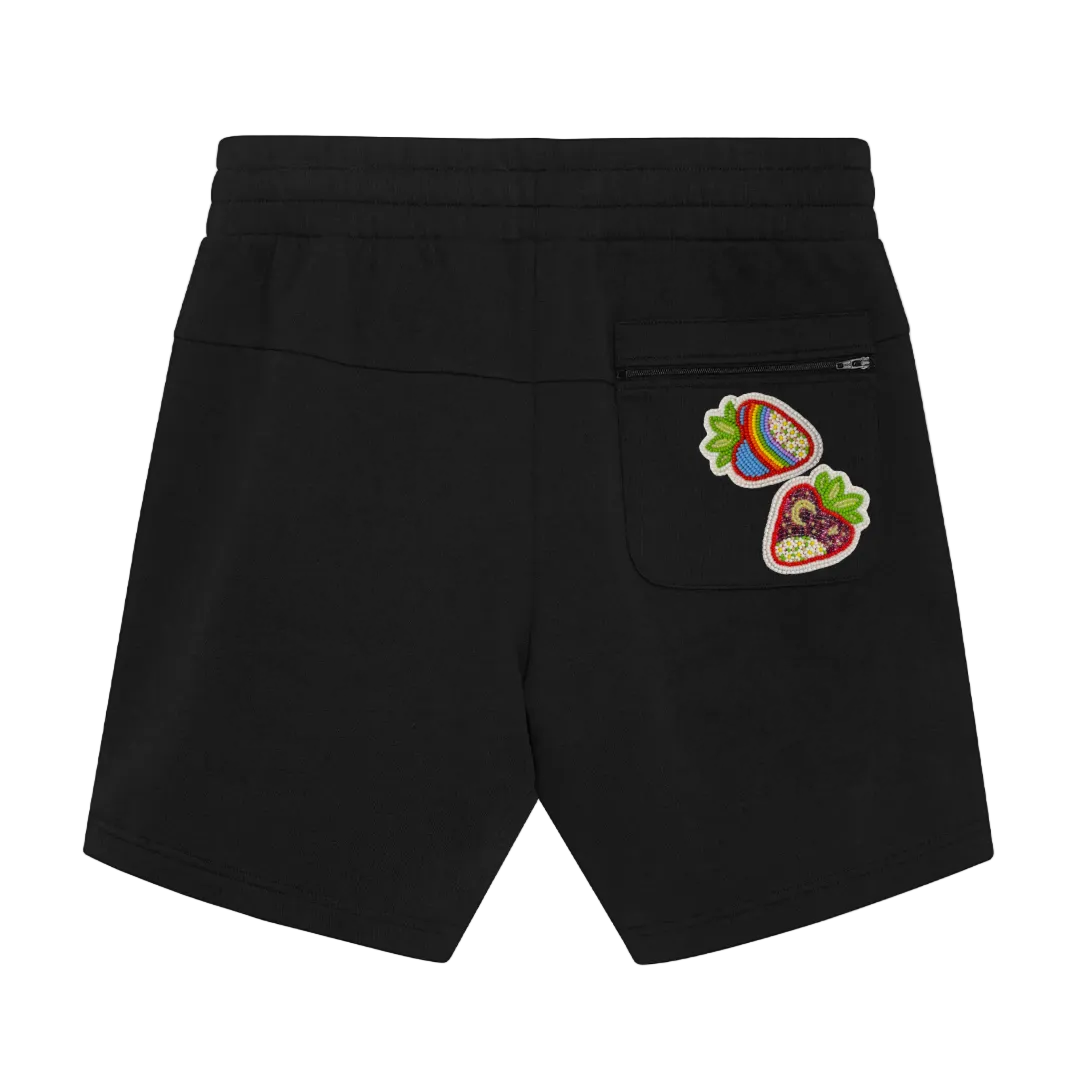 Black shorts with colorful patches on back right pocket.